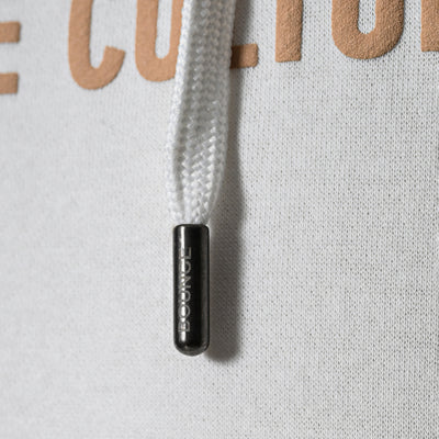 Bounce-branded metal aglet